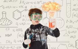 Kid conducting an experiment.