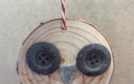 Wood slice owl ornament.