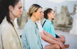 People meditating. 