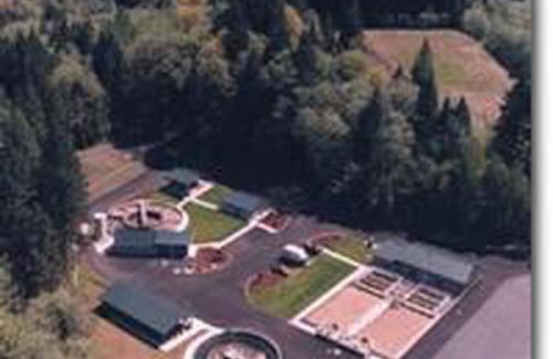 Aerial view of the Sandy wastewater treatment plant with Mount Hood in the background