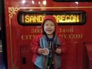 Child in front of trolley