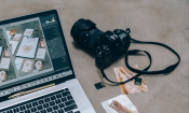 Camera and laptop with photo editing software on the screen.