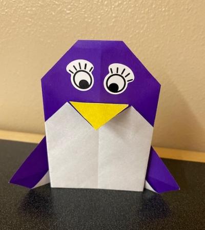 Purple origami penguin