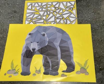 Image of bear made from stickers.