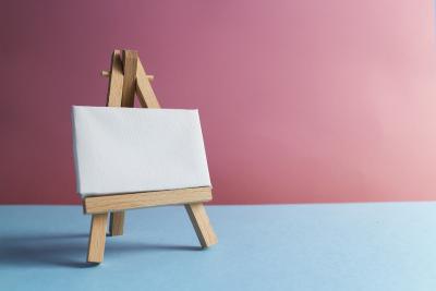 Small easel and blank canvas.