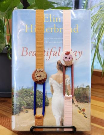 Book with two Ribbon Bookmarks.