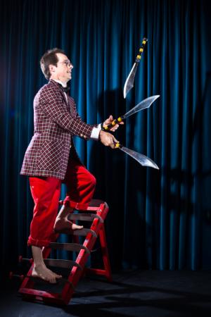 Rhys Thomas juggling knives.