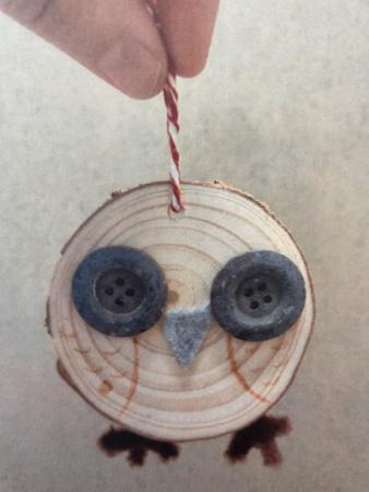 Wood slice owl ornament.