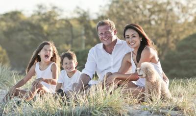 Family sitting together on grass