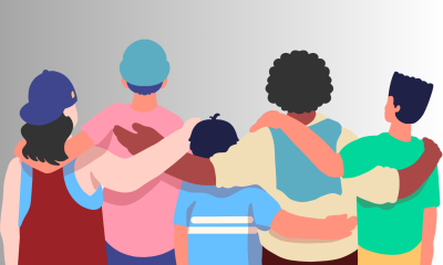 People joining arms.