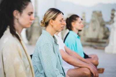 People meditating.