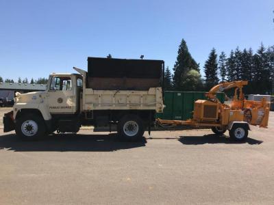 Photo of Dump Truck with Chipper attached